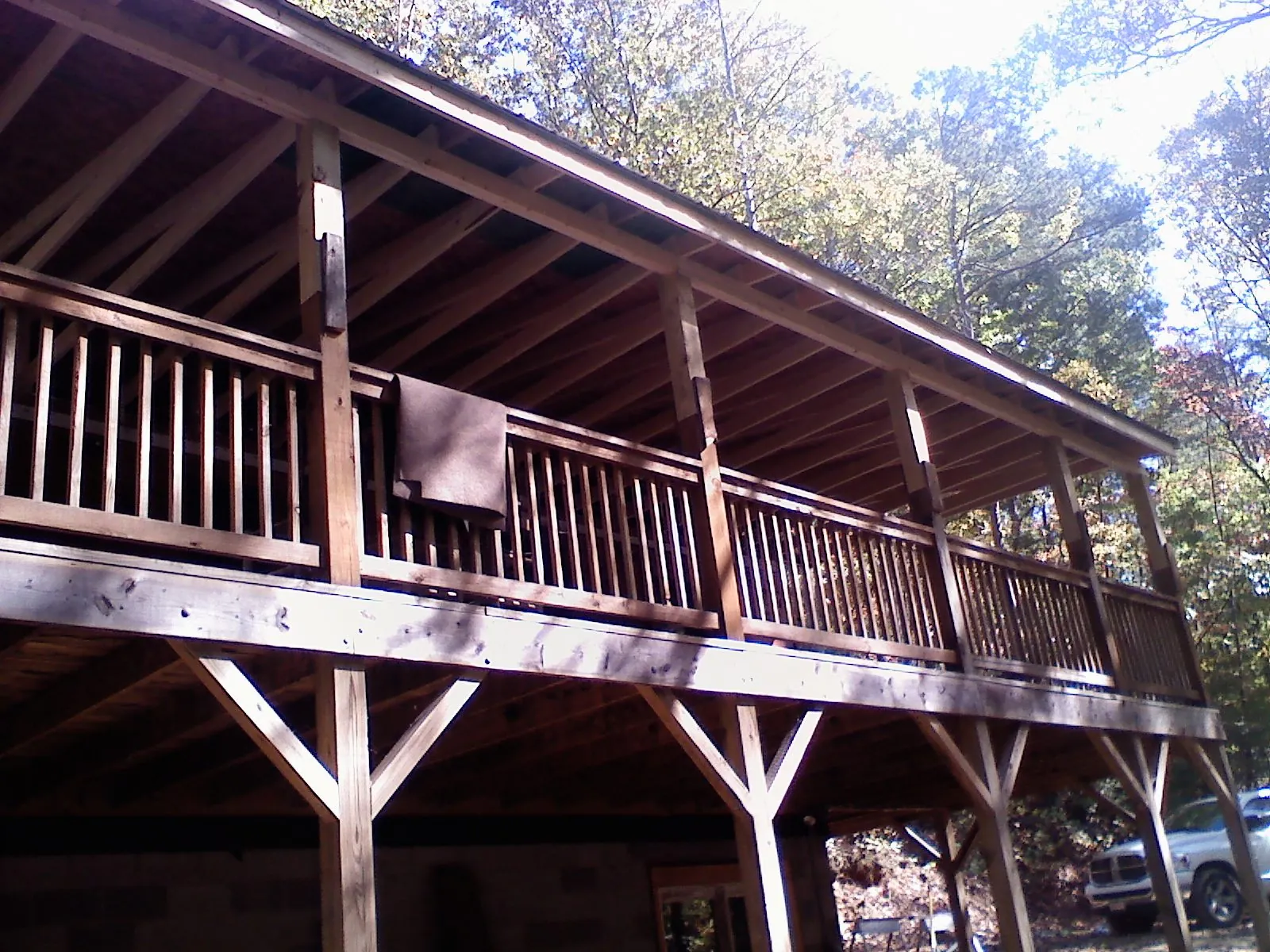 Timber framing under a new elevated porch and deck — Roof Leak Repair in Higginsville by Roofing Brothers